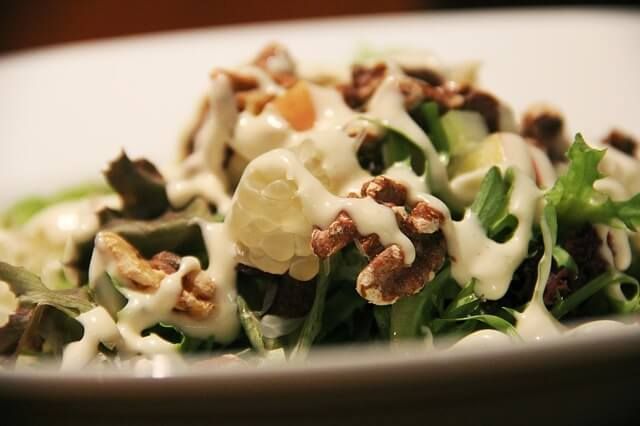 salad with avocado, walnuts and gorgonzola, typical summer dish